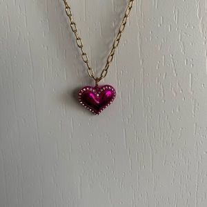 Small pink heart necklace. New never used